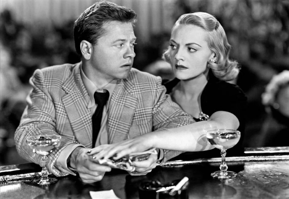 Mickey Rooney and Jeanne Cagney seated at a bar in Quicksand